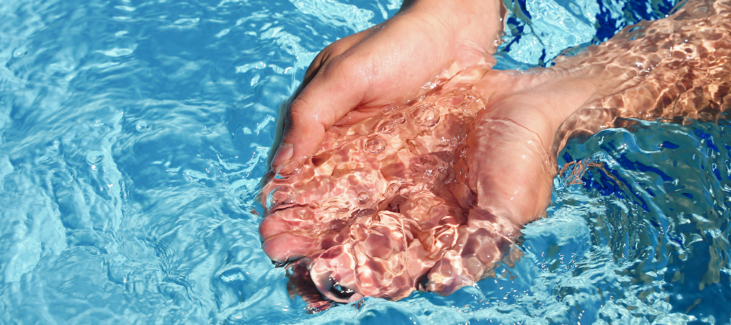 hands in water